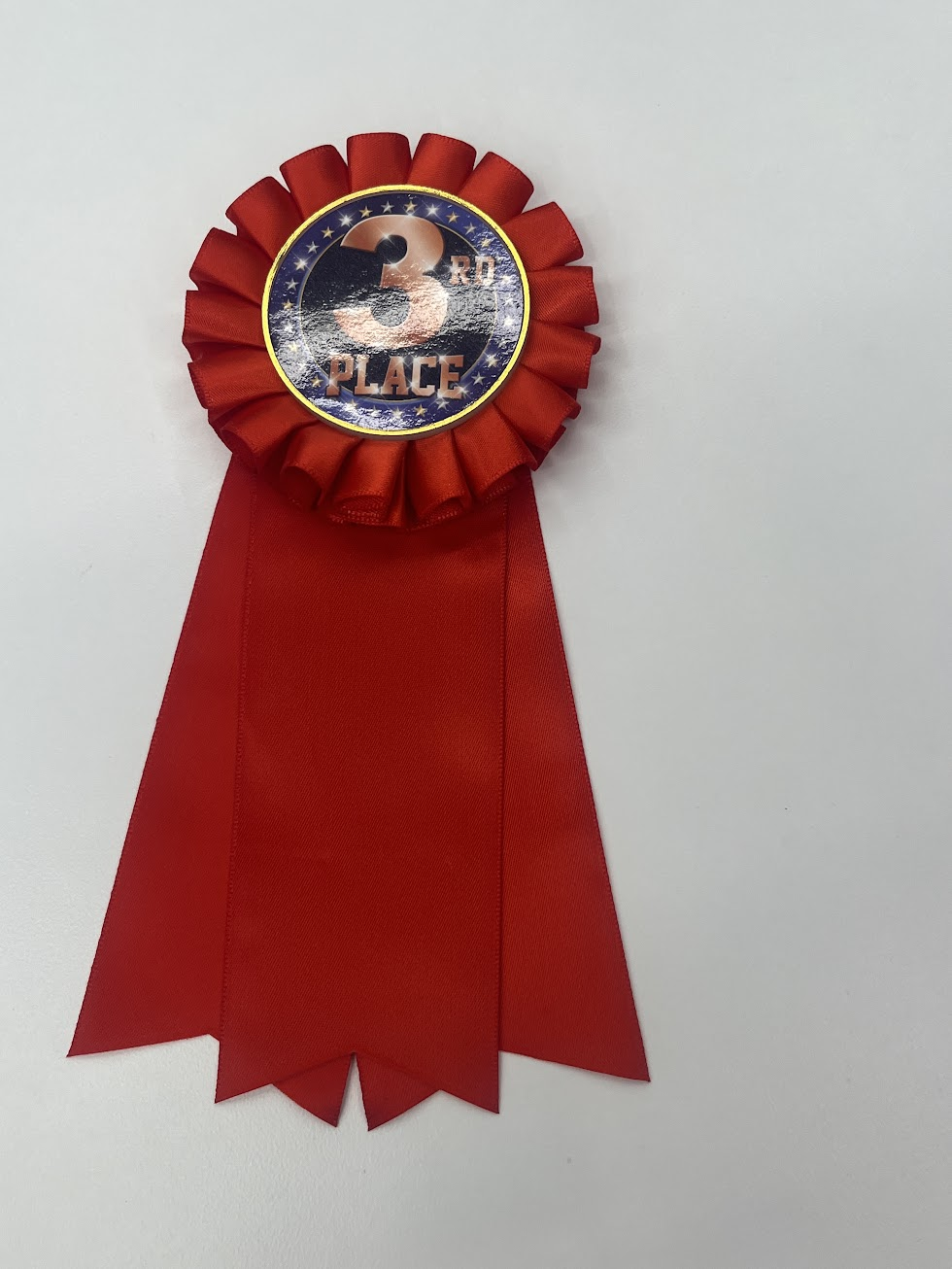 Third-place award ribbon from the rib competition