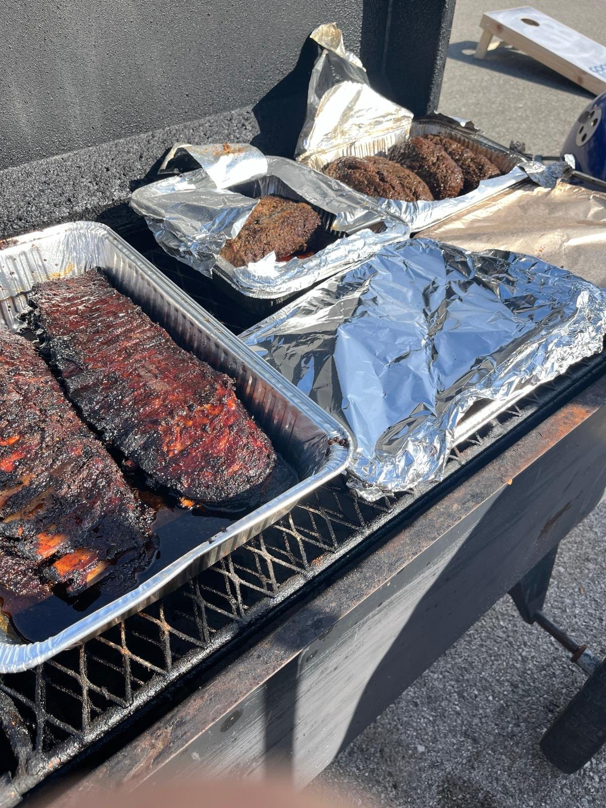 Outdoor community cookout and shared food