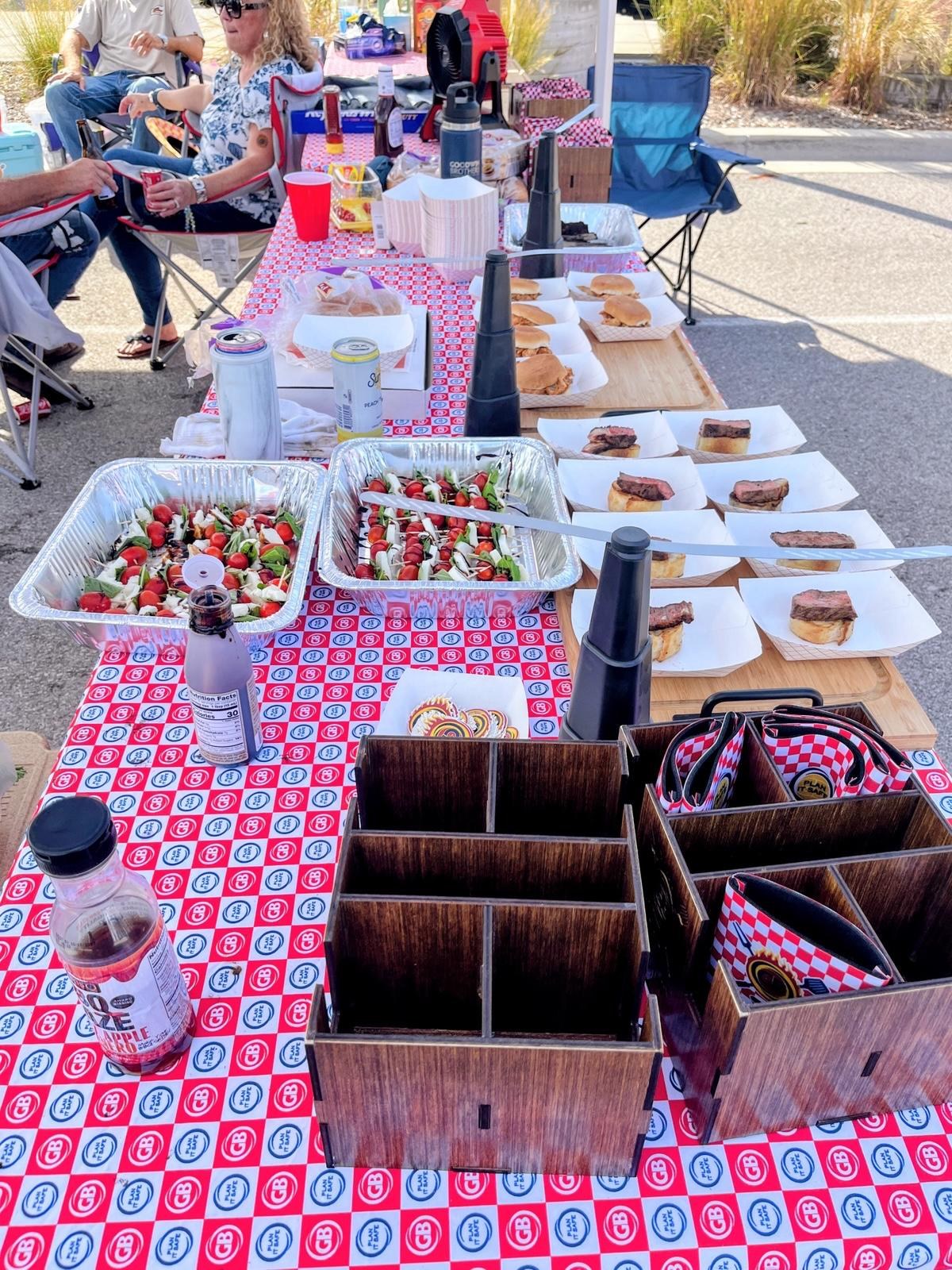 Guests and food at the outdoor community gathering