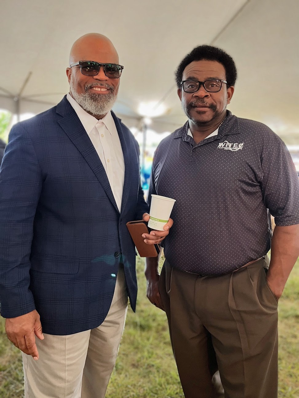 Two guests in conversation at the opening